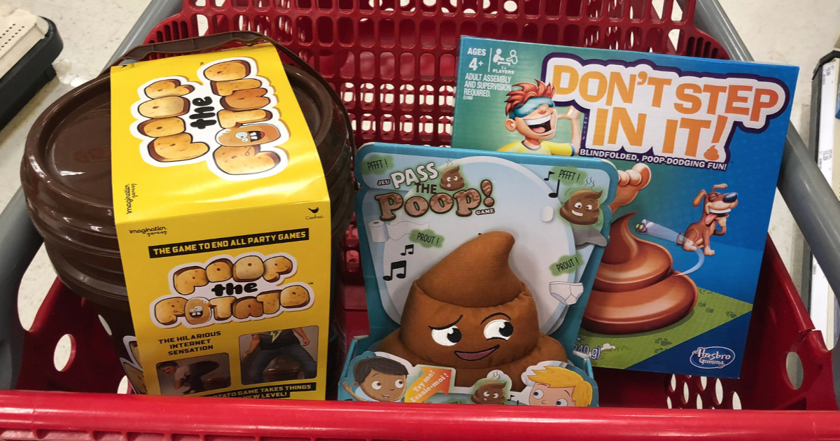 poop-themed board games in a Target shopping cart