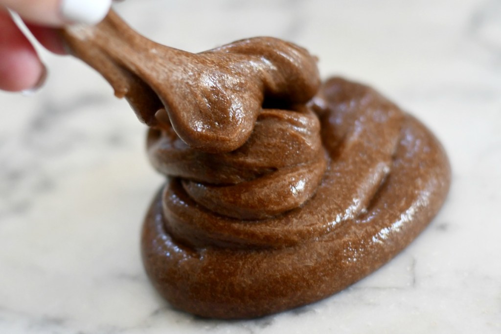 make a poop emoji with chocolate slime 