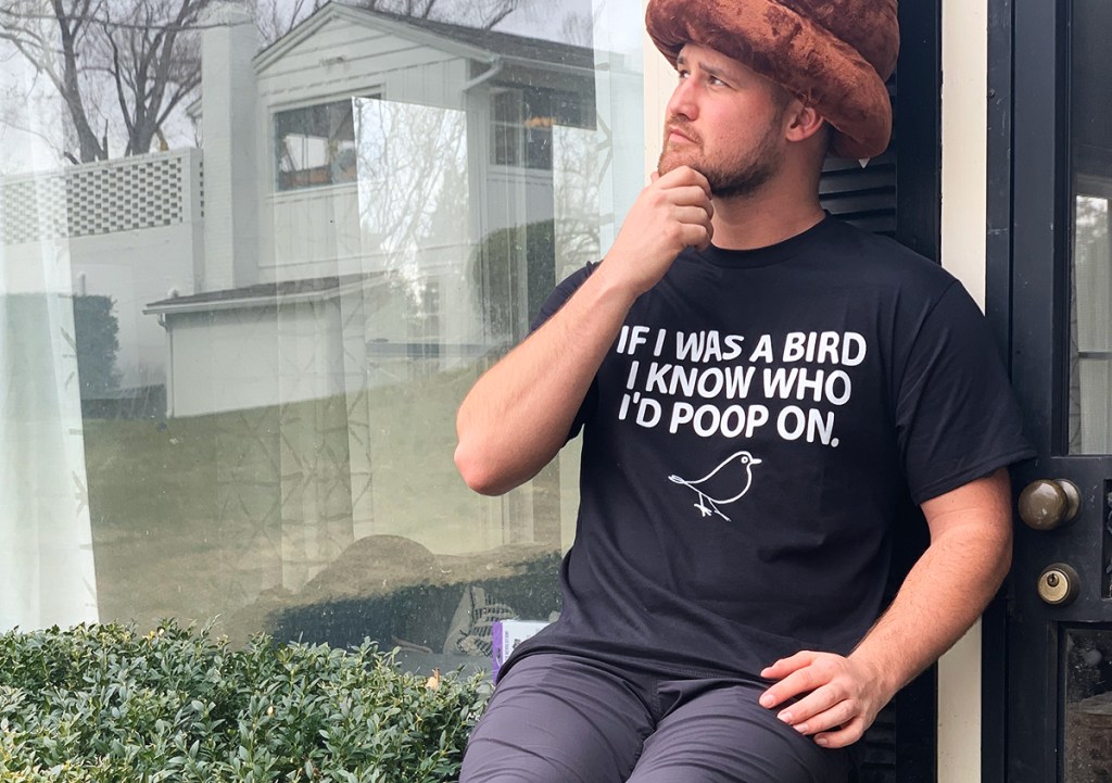 stetson wearing shirt that says "if I were a bird I know who I'd poop on"