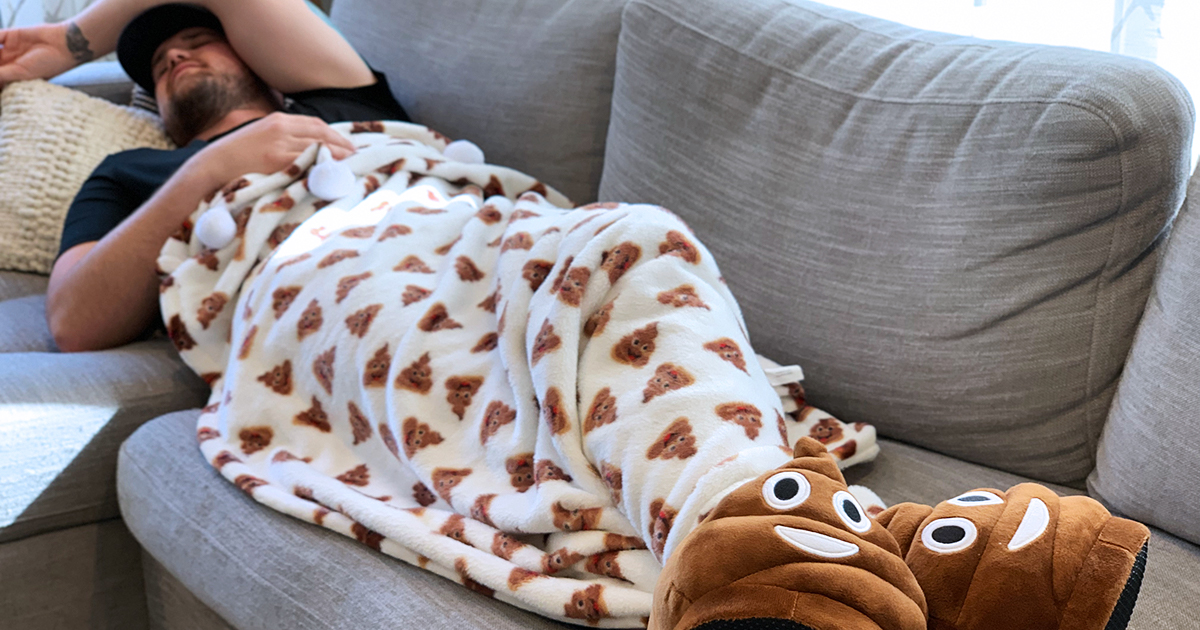 stetson covered in blanket with poop emojis